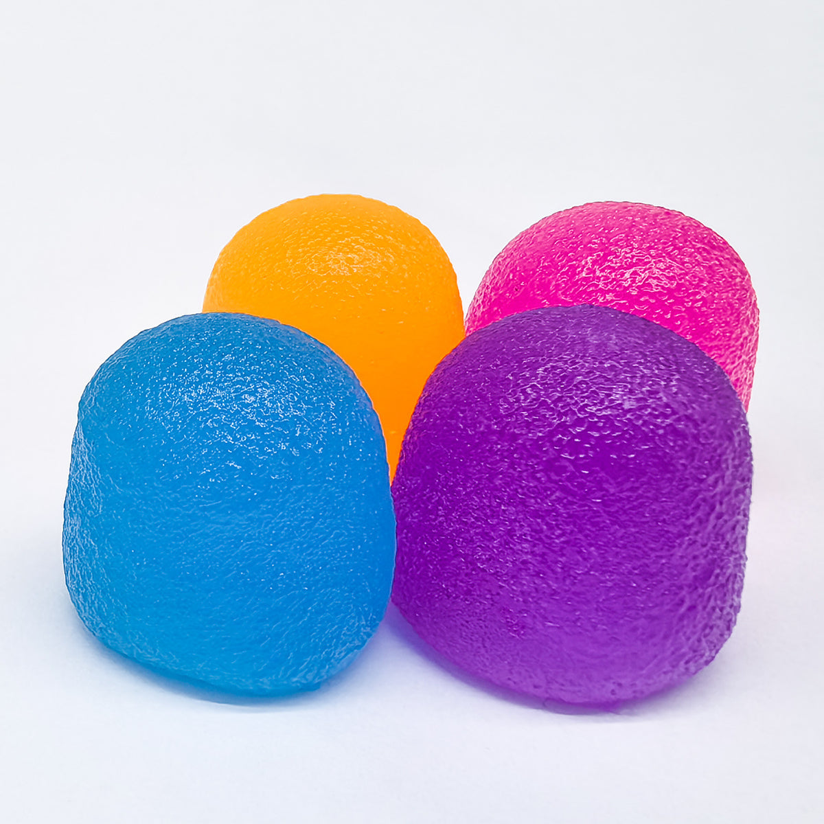 4-Pack Gube Mochi Stones - Stretchy glitter cats - Neon Pink Orange Blue